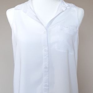 Sleeveless white button down blouse
